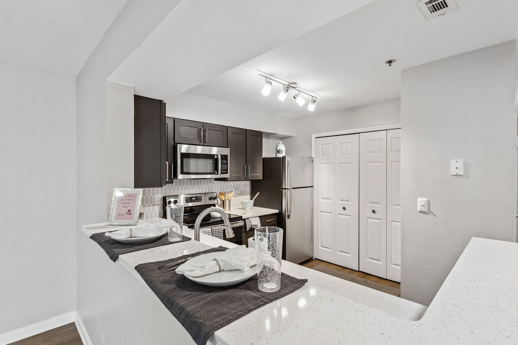 Kitchen with dark cabinets at England Run North in Fredericksburg VA